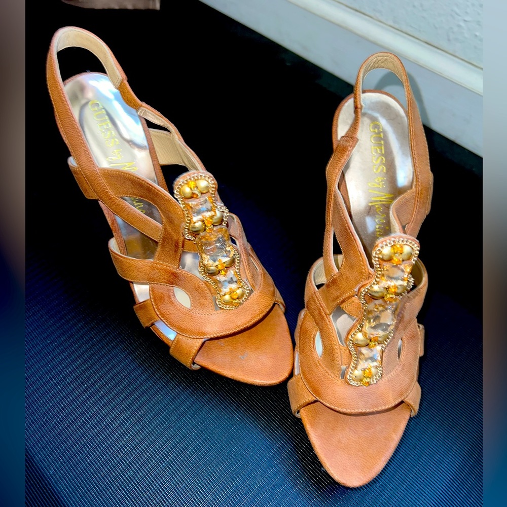Tan open toed heel.